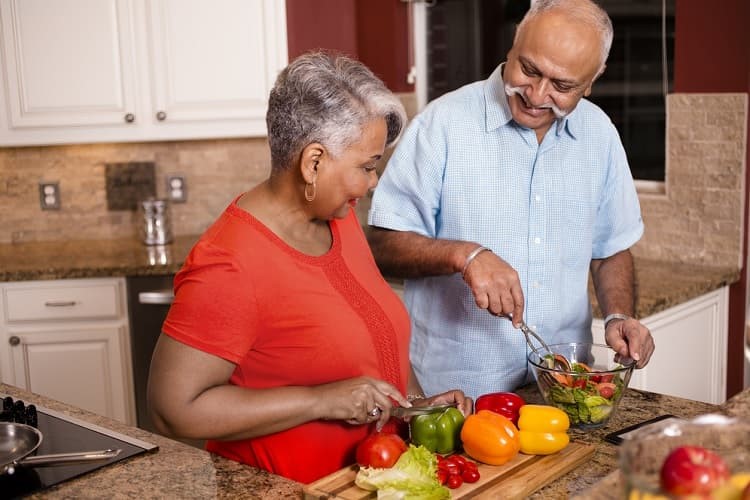 people preparing vegetables